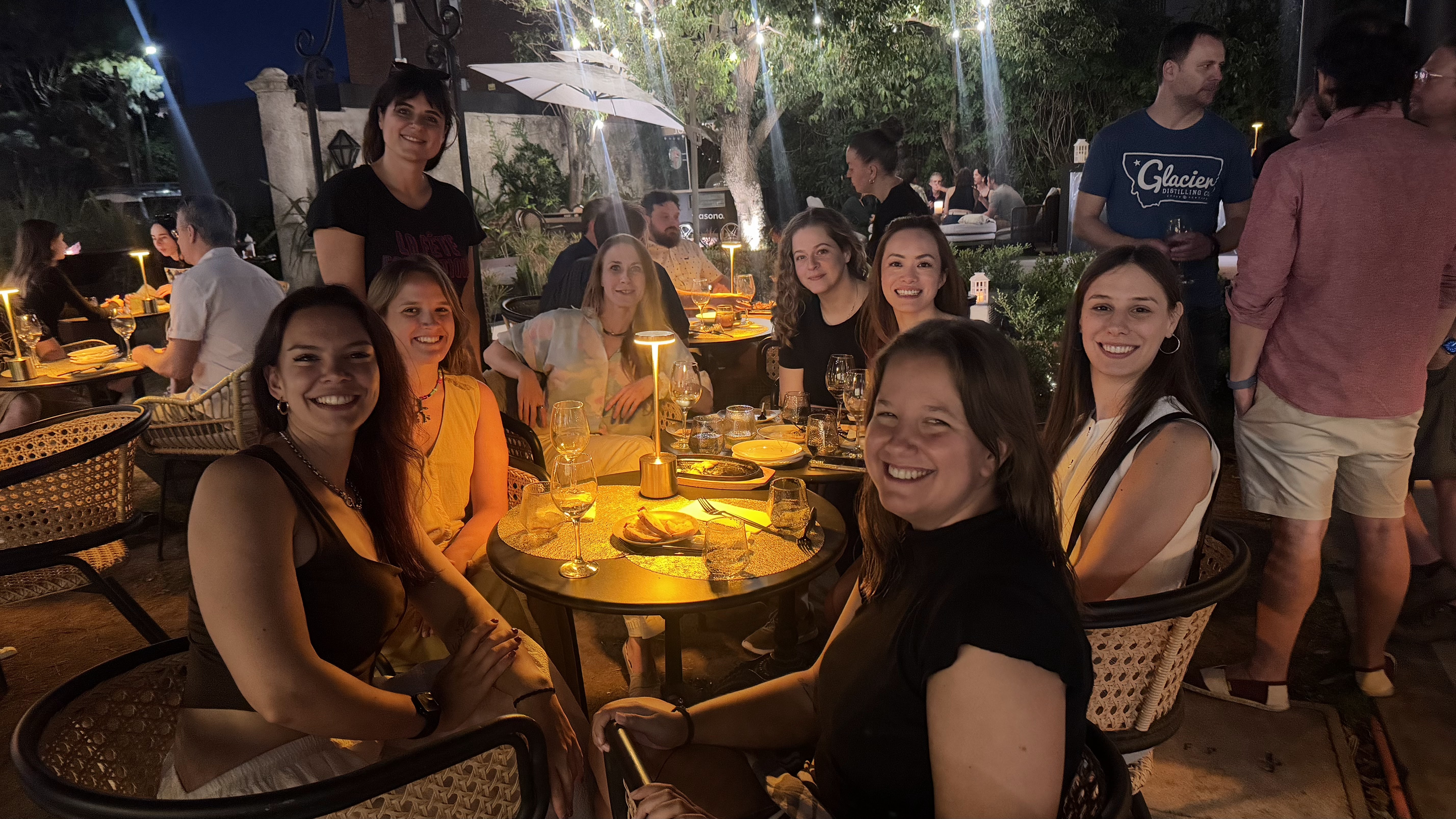 Community members sharing dinner together during a MonteVIDEO Tech gathering